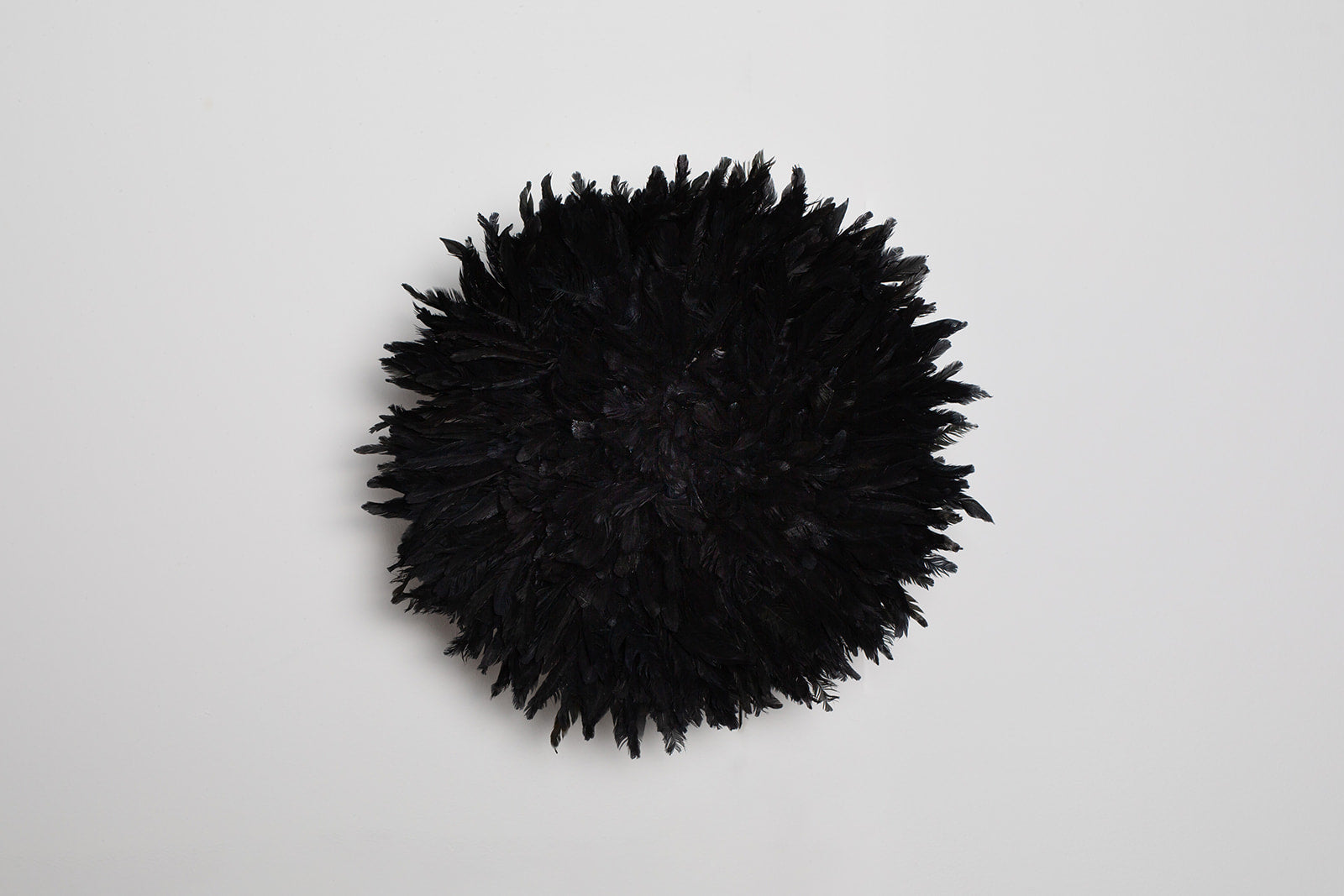 Handcrafted blackish purple Juju hat for interior wall hanging