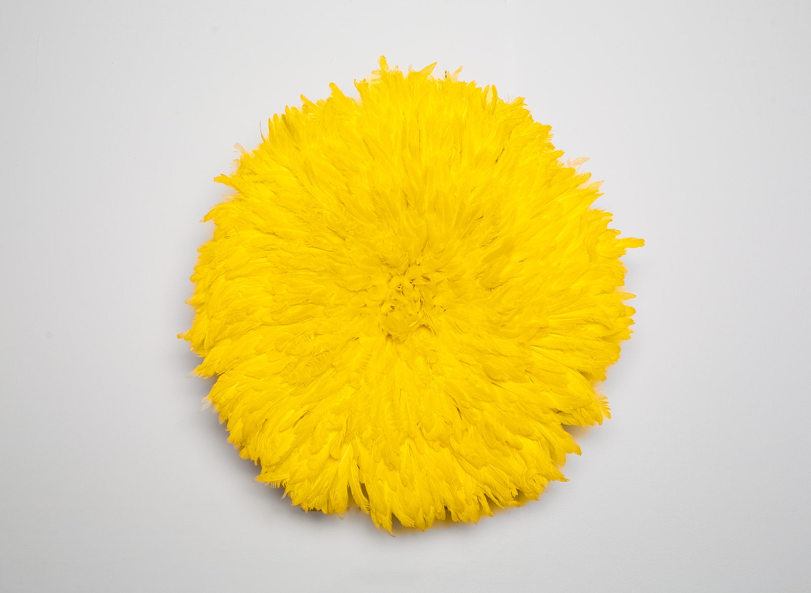 Handcrafted  yellow Juju hat for interior wall hanging